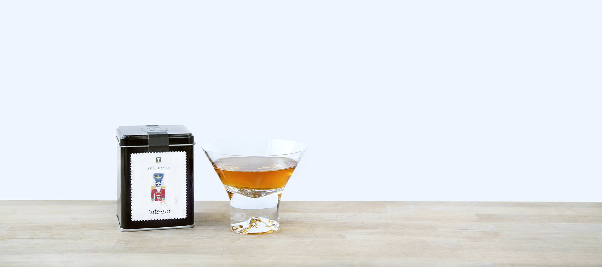 whiskey tea infused cocktail with cacao bitters, scotch, and black tea mixology 