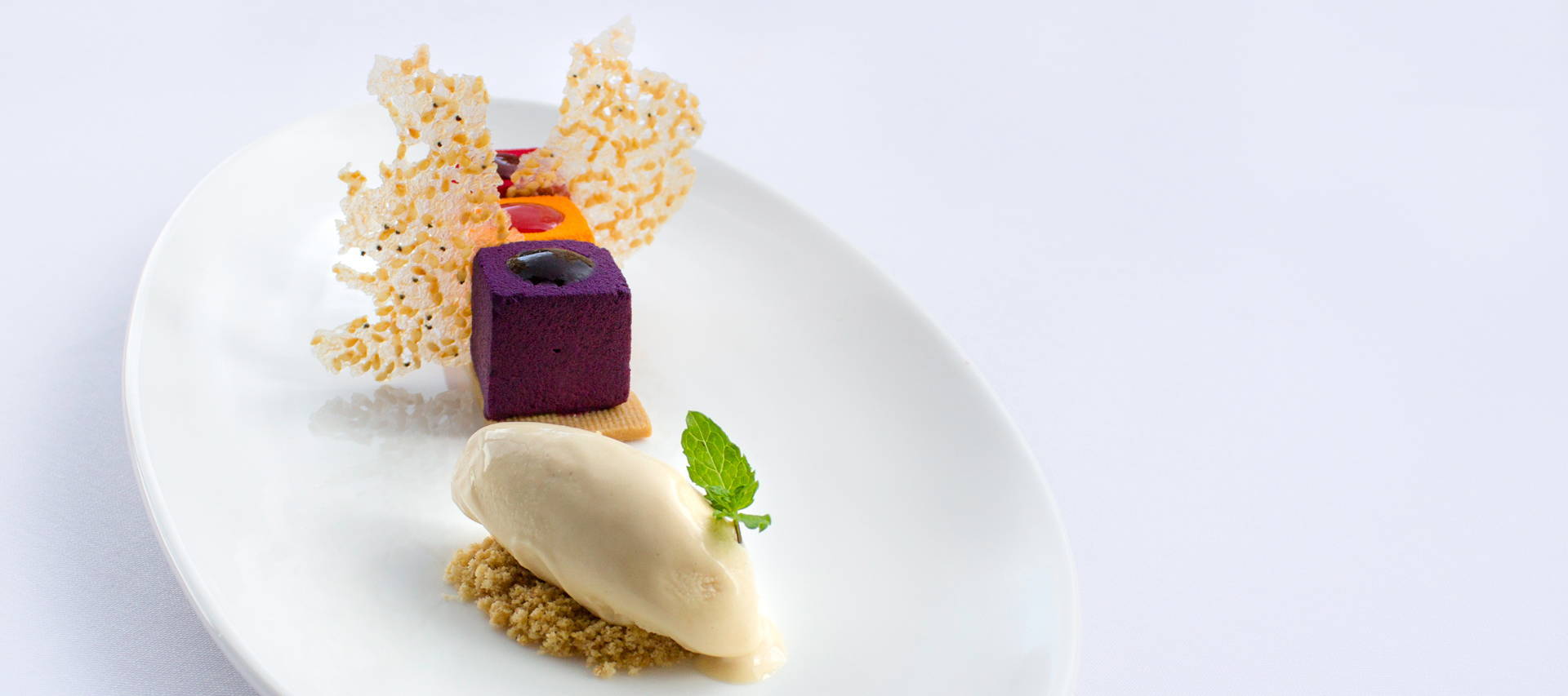 pastry recipe with plum panna cotta, cassis panna cotta, satsuma panna cotta, sable viennois, sesame tuile, tea infused ice cream 